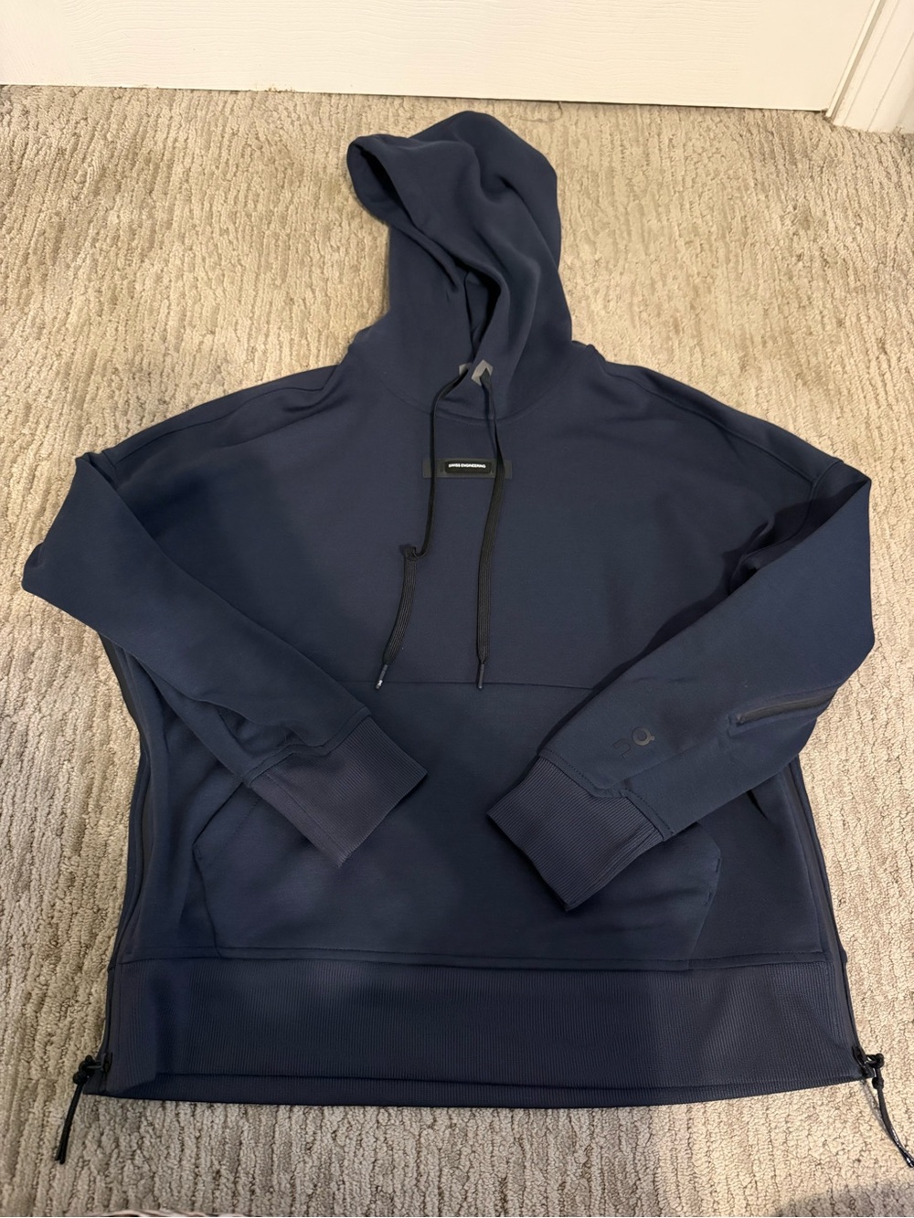On cloud Navy Performance Hooded Jacket fits up to a m/l